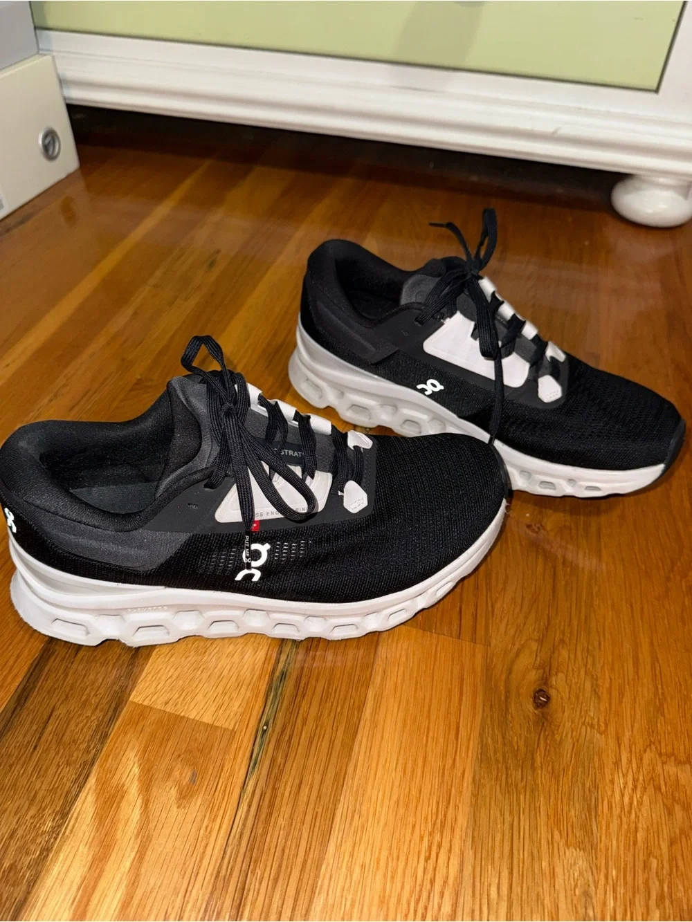 On Cloud Women's Black and White Running Sneakers